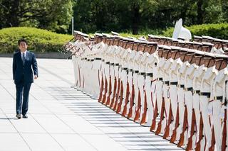 Japan’s Prime Minister Shinzo Abe inspects an honour guard ahead of a Self Defense Forces senior officers’ meeting in Tokyo, September 2019.