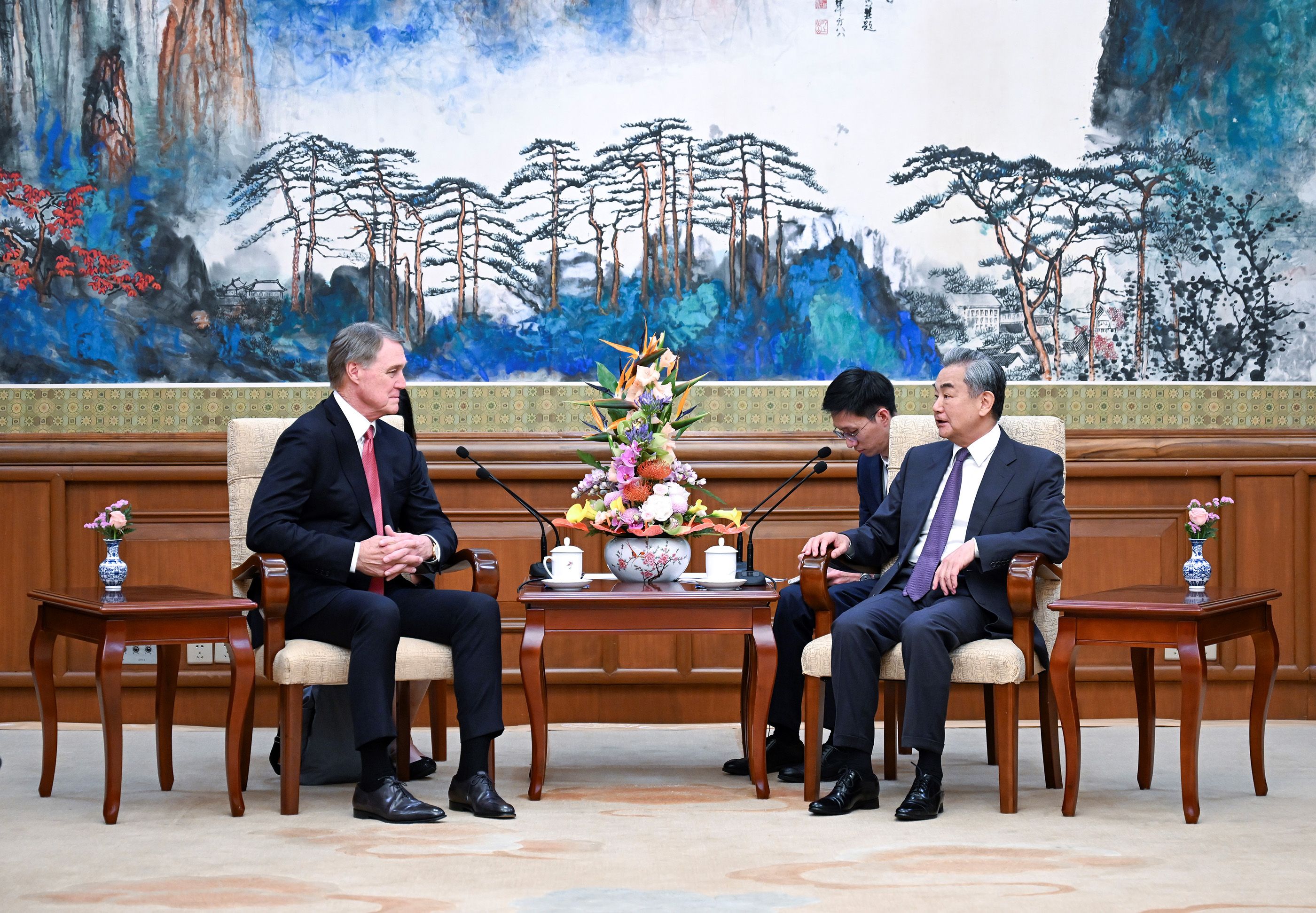 US Ambassador to China David Perdue met with Chinese Foreign Minister Wang Yi in Beijing in June 2025.