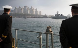 HMAS Arunta enters the port city of Busan, Republic of Korea, as part of the ship’s North East Asian deployment