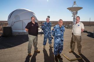 Air Force Test Ranges Squadron personnel atop Instrumentation Building at Woomera Test Range