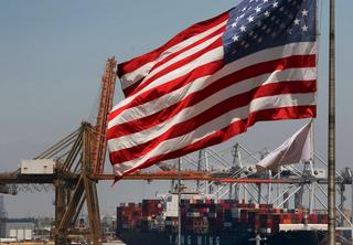 Americna flag at container ship port.
