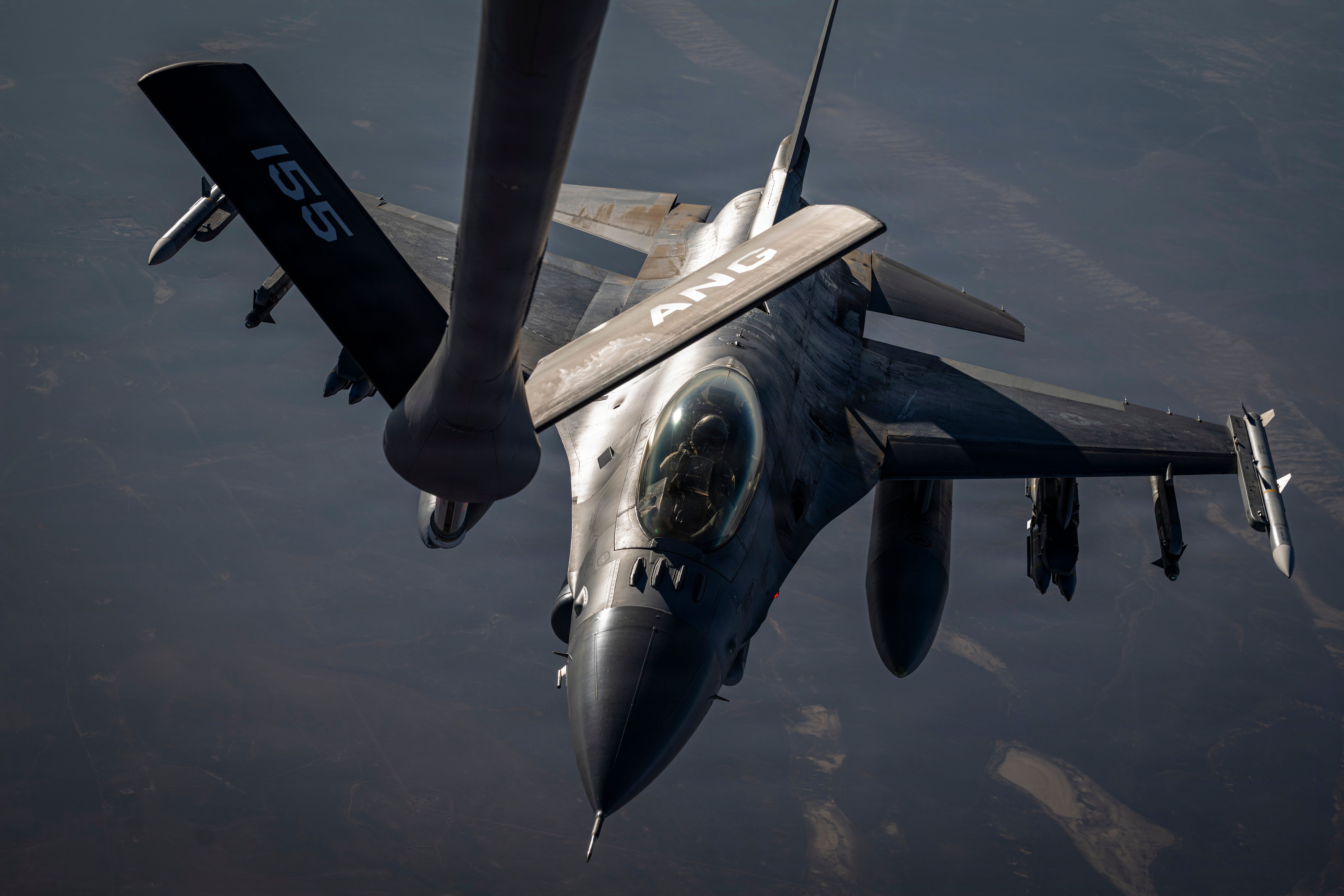 A U.S. Air Force F-16 Fighting Falcon aircraft approaches a KC-135 Stratotanker aircraft to refuel in the U.S. Central Command area of responsibility July 22, 2026. 