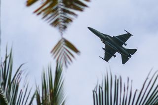 A Philippine Air Force fighter jet McDonnell Douglas F-15 Eagle manoeuvres during the exercise of Combined and Joint Forcible Entry Operations, as part of the ongoing 'ALON 25' military exercise, at a beach in San Vicente, Palawan, Philippines, on August 24, 2025.