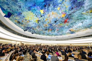 Delegates attend a session of the UN Human Rights Council, June 2017