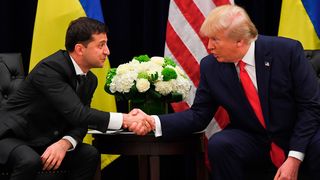 Ukrainian President Volodymyr Zelensky and US President Donald Trump shake hands during a meeting in New York, 25 September 2019