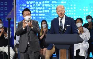 US President Joe Biden delivers remarks with South Korean President Yoon Suk-yeol as they visit the Samsung Electronics Pyeongtaek campus in South Korea, May 2022