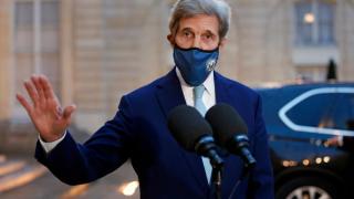 US Special Presidential Envoy for Climate John Kerry speaks to the press following his meeting with French President Emmanuel Macron