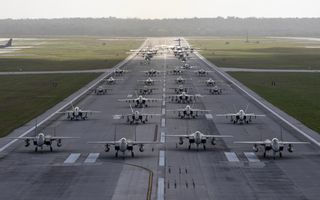 Aircraft from the Royal Australian Air Force, United States Air Force, United States Marine Corps, Japan Air Self-Defense Force, Republic of Korea Air Force and French Air and Space Force participate in an elephant walk to mark the beginning of Exercise Cope North 2024, Andersen Air Force Base, Guam
