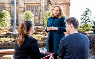 Two USSC alumni chatting together