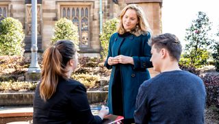 Two USSC alumni chatting together