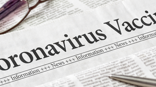 COVID-coronavirus-vaccine-newspaper-HEADER-GettyImages-1227115305.png