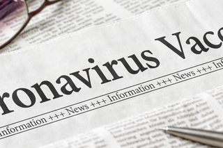 COVID-coronavirus-vaccine-newspaper-HEADER-GettyImages-1227115305.png