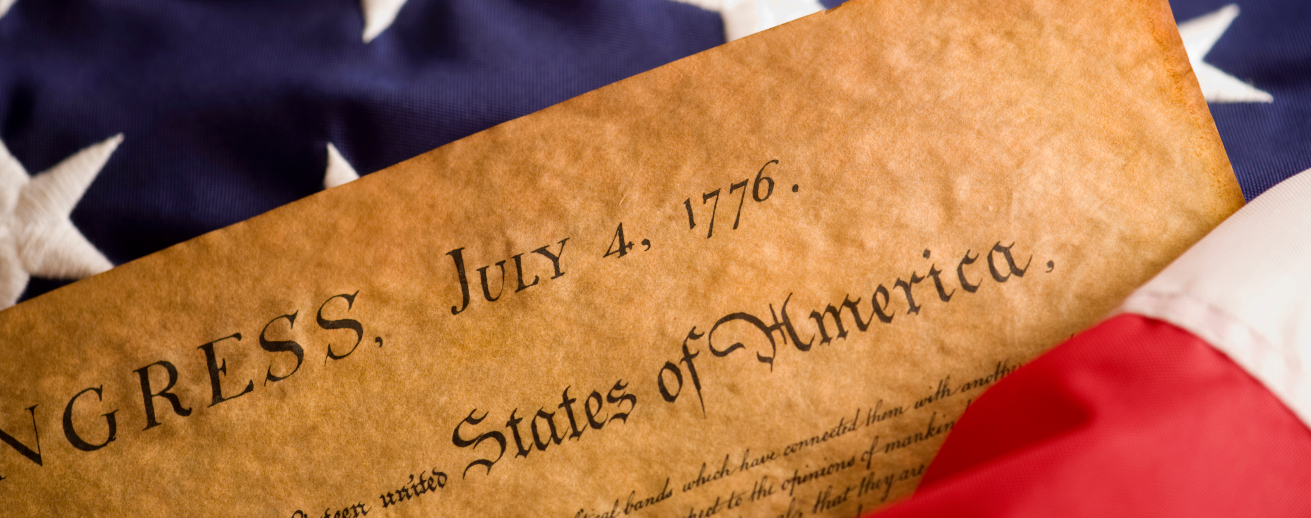 declaration-of-independence-with-flag-header-GettyImages-91832605.png