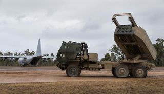 A HIMARS (High Mobility Artillery Rocket System) performs a simulated firing drill at Williamson Airfield during Exercise Talisman Sabre 2019