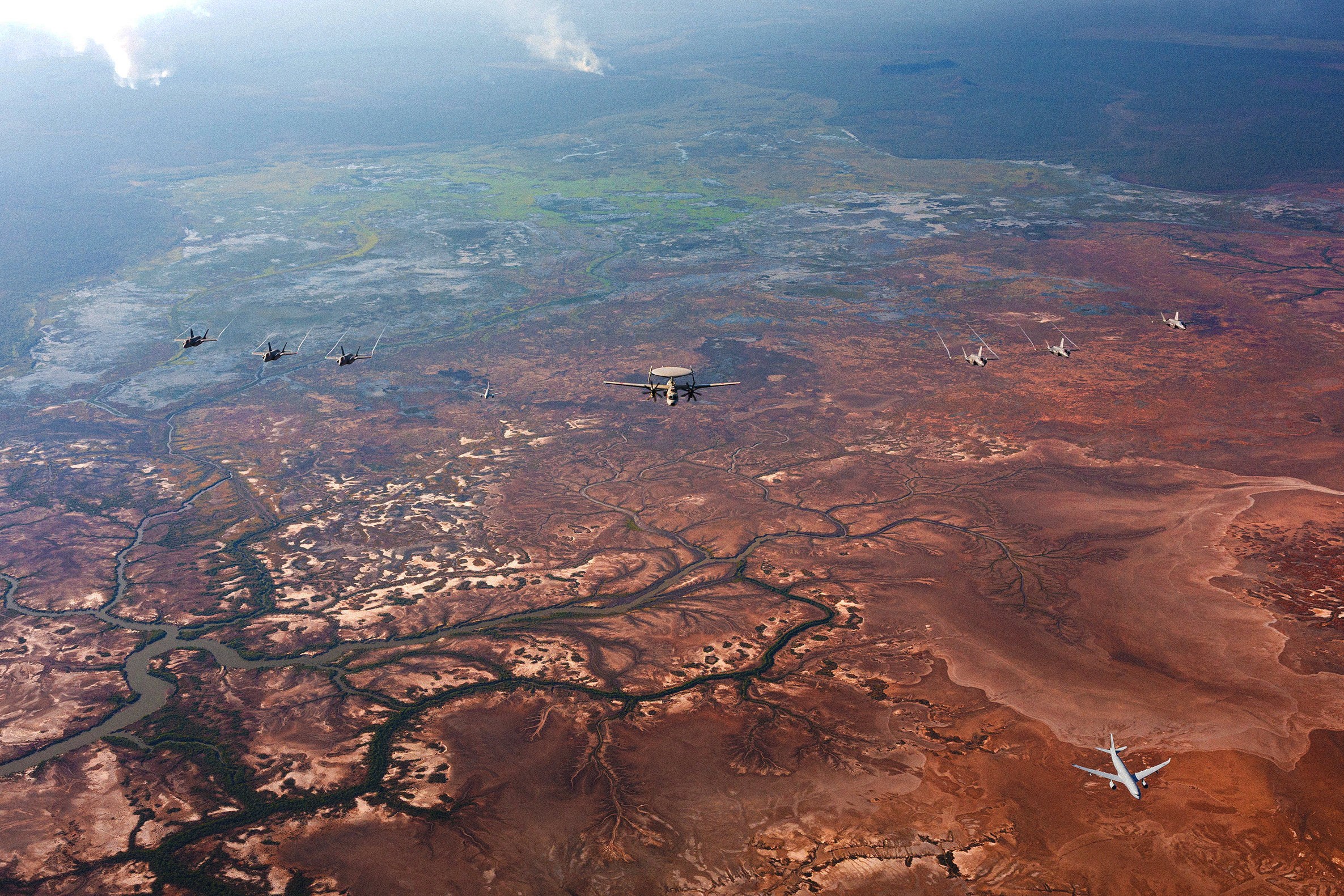Royal Australian Air Force, United States Pacific Air Force and Japanese Air Self Defence Force aircraft conduct a trilateral photo exercise during Exercise Southern Cross in the Northern Territory, Australia.