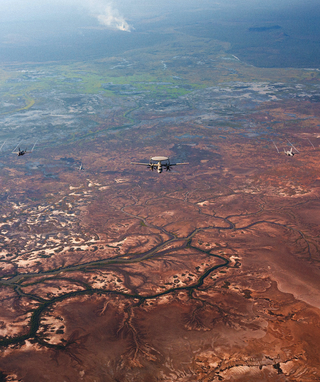 Royal Australian Air Force, United States Pacific Air Force and Japanese Air Self Defence Force aircraft conduct a trilateral photo exercise during Exercise Southern Cross in the Northern Territory, Australia.