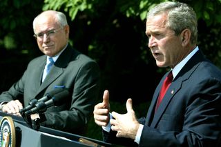 U.S. President George W. Bush (R) and Australian Prime Minister John Howard speak in the Rose Garden at the White House June 3, 2004 in Washington, DC. The two leaders met in the Oval Office and discussed Australian and U.S. relations as well as the war in Iraq.