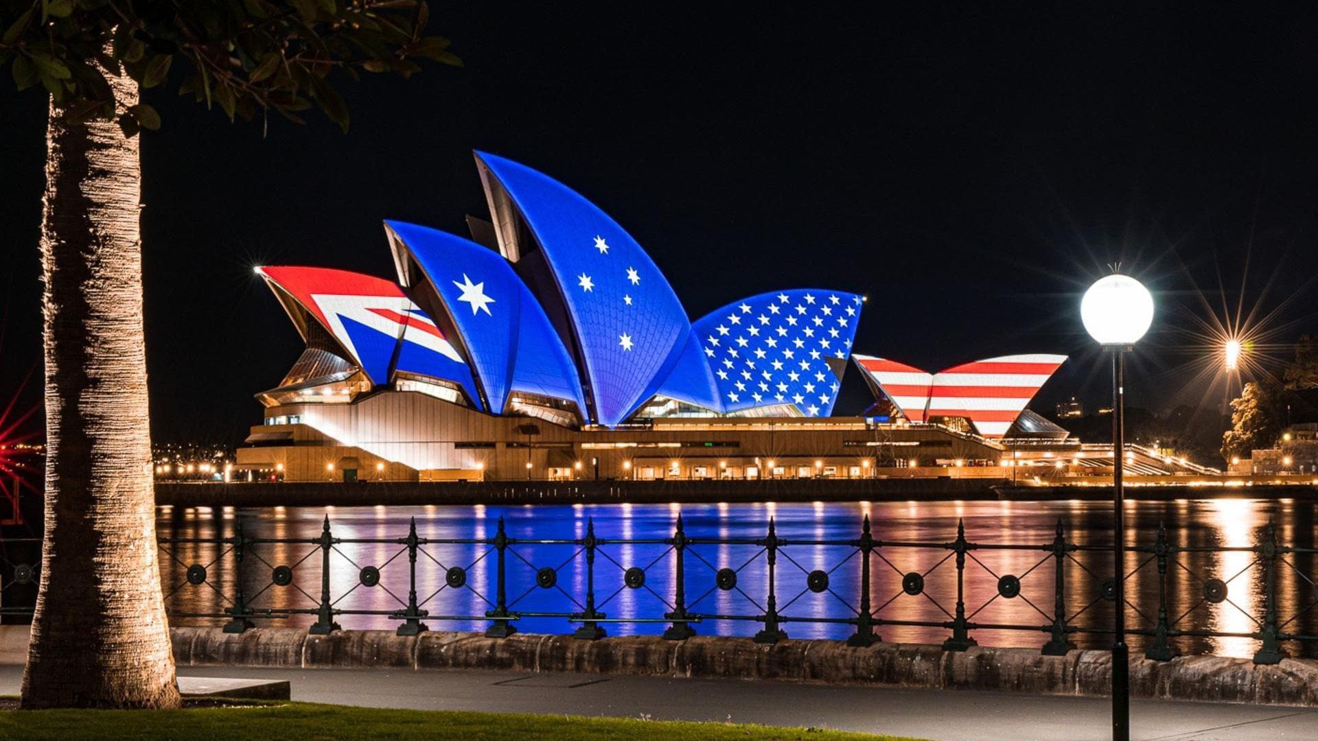 Sydney Opera House lit up with Australian and US flag design