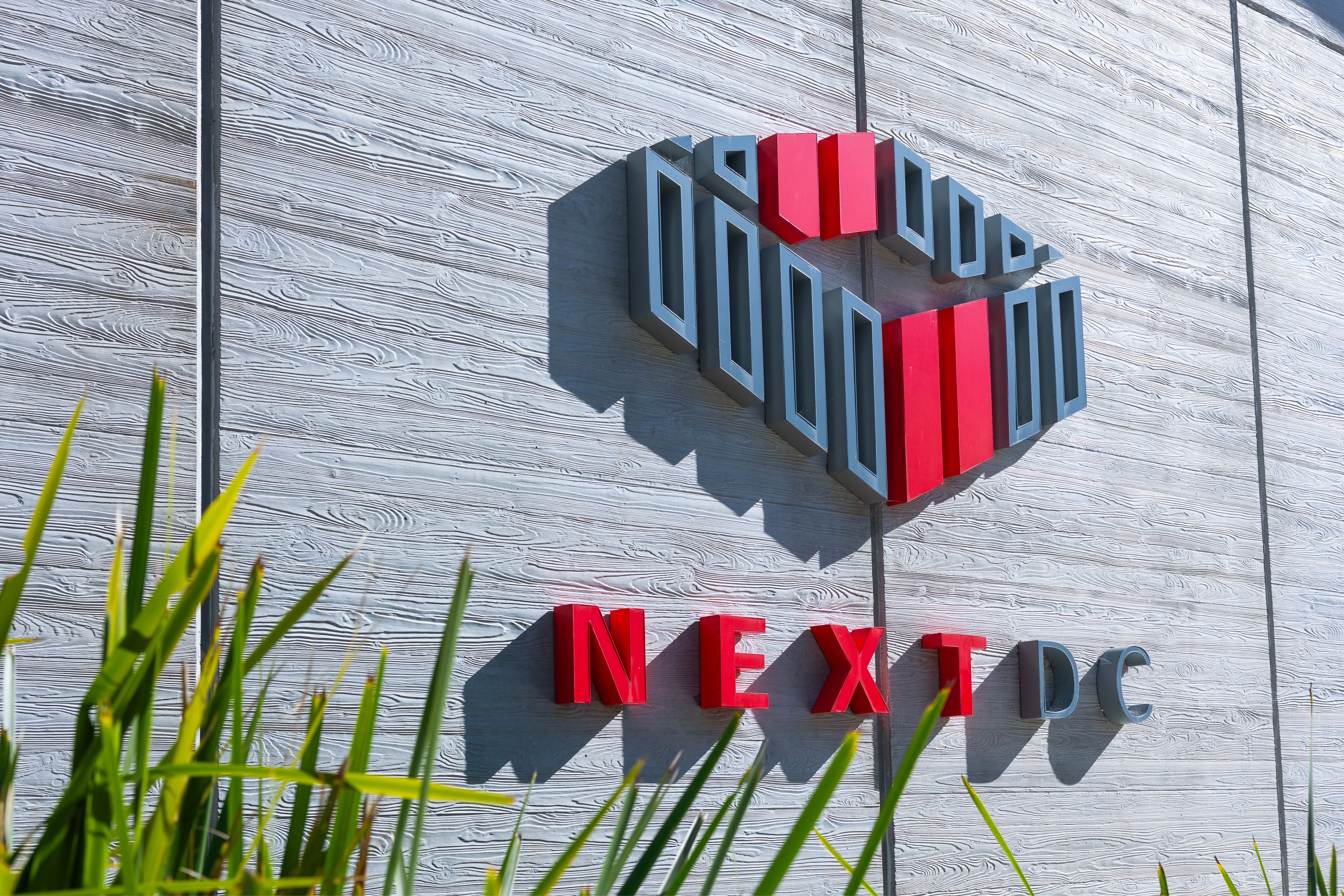 Logo of data centre operator Next DC