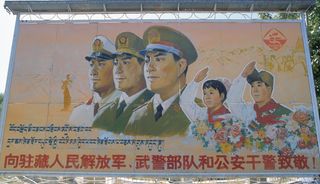 Billboard emphasizing the hegemonic relationship between China and Tibet