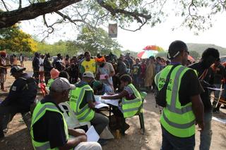 Voters gather at a polling station to vote in the Papua New Guinea general elections, Port Moresby, July 2022.