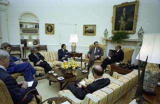 President Gerald Ford and Prime Minister Malcolm Fraser in the Oval Office, 1976 (with Foreign Affairs Minister Andrew Peacock, Ambassador to the United States Nicholas Parkinson, Secretary of the Department of the Prime Minister and Cabinet John L Menadue, National Security Adviser Brent Scowcroft and US Ambassador to Australia James W Hargrove)