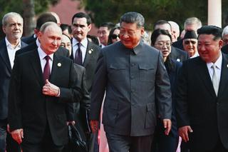 Russia's President Vladimir Putin walks with China's President Xi Jinping and North Korea's leader Kim Jong Un before a military parade marking the 80th anniversary of victory over Japan and the end of World War II, in Beijing's Tiananmen Square on September 3, 2025