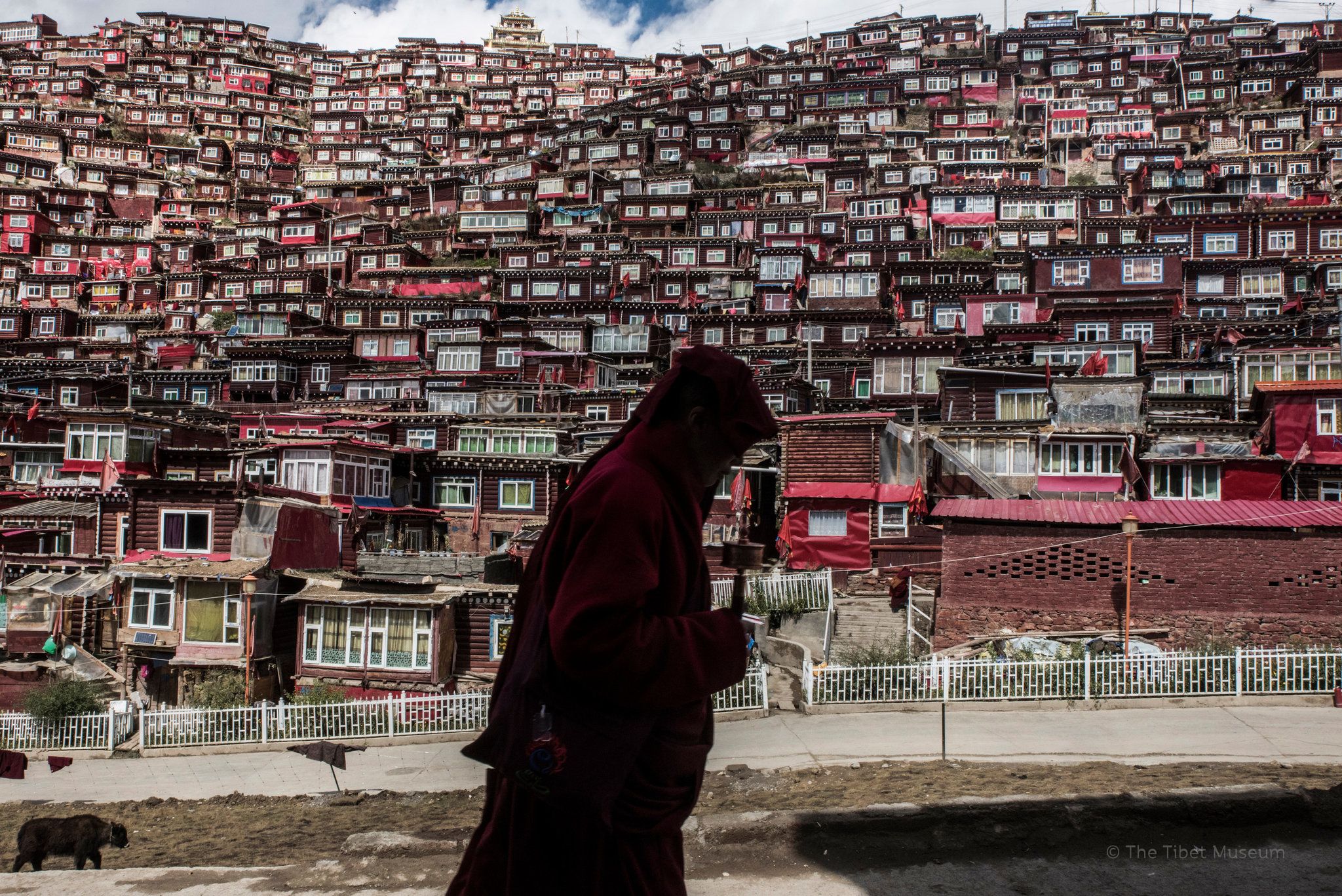 A man walking in Larung Gar