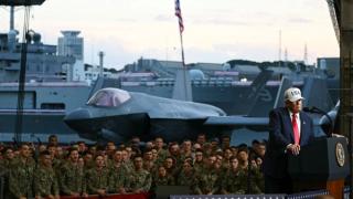 US President Donald Trump delivers a speech in front of US Navy personnel on board the US Navy's USS George Washington aircraft carrier at the US naval base in Yokosuka on October 28, 2025
