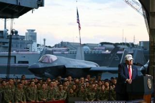 US President Donald Trump delivers a speech in front of US Navy personnel on board the US Navy's USS George Washington aircraft carrier at the US naval base in Yokosuka on October 28, 2025