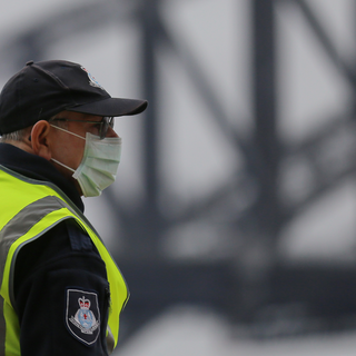 1-masked-man-cropped-GettyImages-1207078545.png