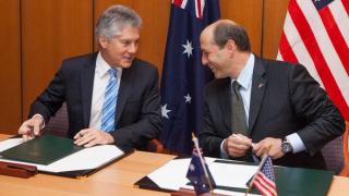Australian Minister for Defence Stephen Smith and US Ambassador to Australia Jeffrey Bleich exchange notes to bring the Defence Trade Cooperation Treaty into effect, May 2013