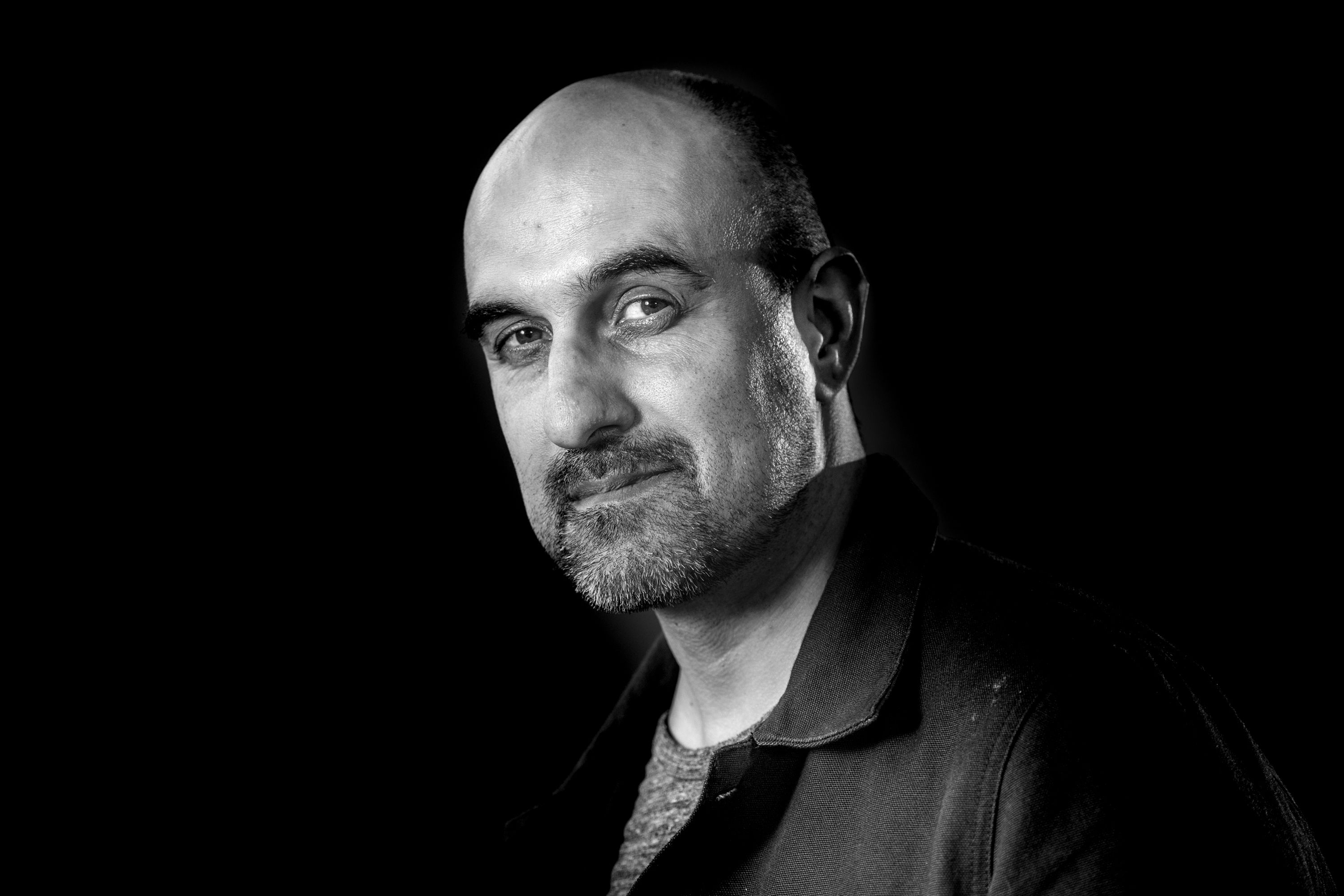 British novelist and journalist Hari Kunzru attends a photocall during the annual Edinburgh International Book Festival at Charlotte Square Gardens on August 25, 2017 in Edinburgh, Scotland.