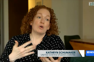 Dr Kathryn Schumaker speaking to a reporter on ABC's 7.30, about the legal landscape under the new Trump administration.