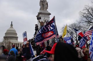 Pro-Trump supporters gather outside the US Capitol following a rally with President Donald Trump on January 6, 2021 in Washington, DC