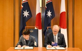 Japan's Prime Minister Sanae Takaichi (L) and Australia's Prime Minister Anthony Albanese take part in a signing ceremony for a joint declaration of economic security cooperation at Parliament House in Canberra on May 4, 2026.
