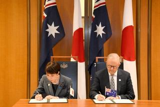 Japan's Prime Minister Sanae Takaichi (L) and Australia's Prime Minister Anthony Albanese take part in a signing ceremony for a joint declaration of economic security cooperation at Parliament House in Canberra on May 4, 2026.