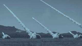 US Marine Corps, Australian Army and Singapore Armed Forces artillery batteries fire their respective High Mobility Artillery Rocket Systems (HIMARS) during a live-fire training activity at Shoalwater Bay training area during Exercise Talisman Sabre 2025.