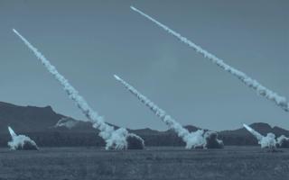 US Marine Corps, Australian Army and Singapore Armed Forces artillery batteries fire their respective High Mobility Artillery Rocket Systems (HIMARS) during a live-fire training activity at Shoalwater Bay training area during Exercise Talisman Sabre 2025.