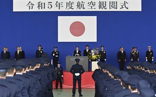 Japanese Prime Minister Fumio Kishida delivers a speech during a ceremony ahead of an Air Self-Defense Force Review at Camp Iruma in Saitama prefecture, Japan, November 2023