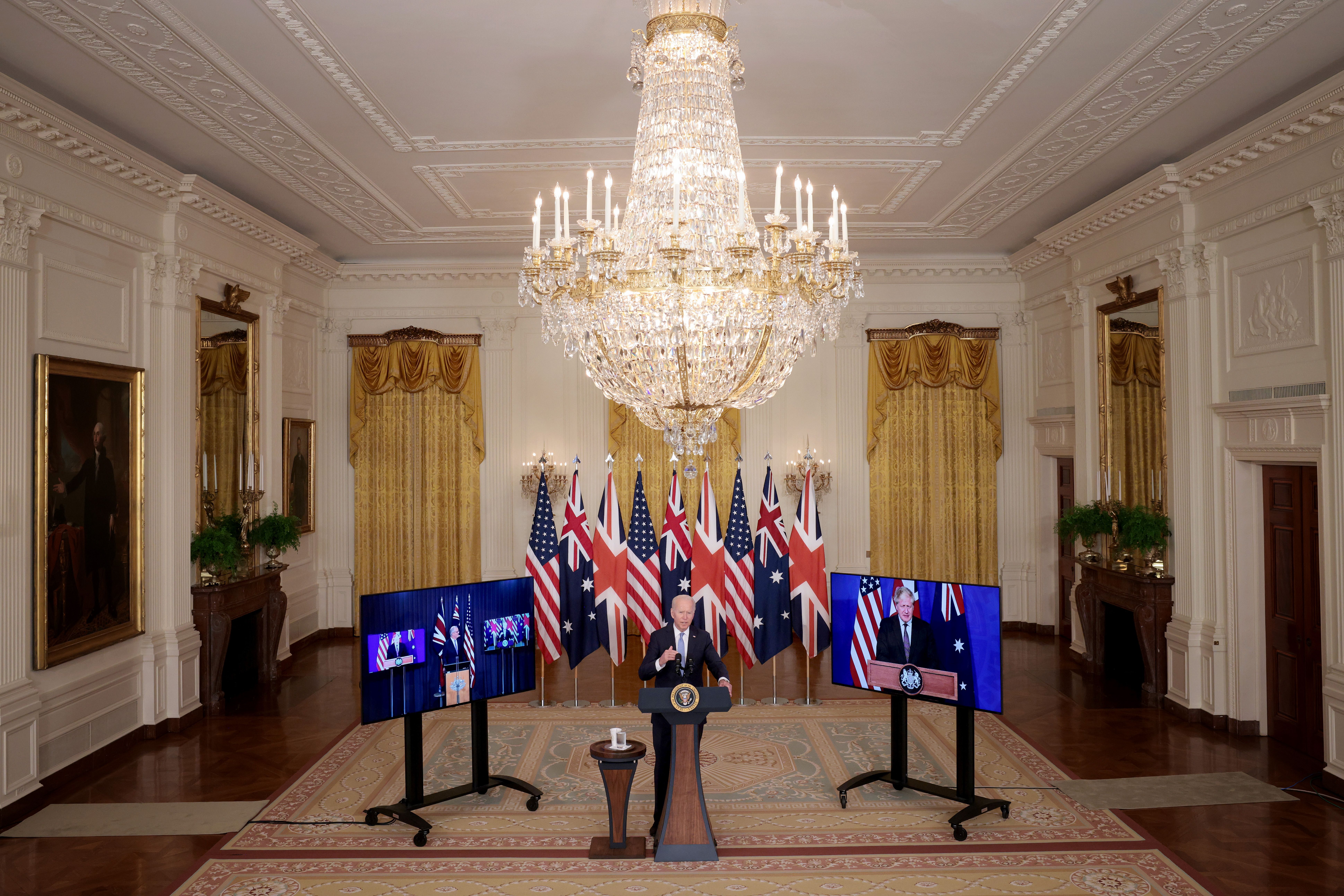U.S. President Joe Biden speaks during an event in the East Room of the White House September 15, 2021 in Washington, DC. President Biden announced a new national security initiative in partnership with Australian Prime Minister Scott Morrison (L) and United Kingdom Prime Minister Boris Johnson (R). (Photo by Win McNamee/Getty Images)