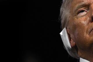 A bandage is seen on the ear of US former President and 2024 Republican presidential candidate Donald Trump after he was wounded in an assassination attempt during the first day of the 2024 Republican National Convention at the Fiserv Forum in Milwaukee, Wisconsin, July 15, 2024.