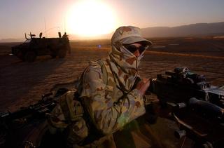 An Australian soldier on patrol near a forward operating base in Afghanistan during Operation Slipper, 2005