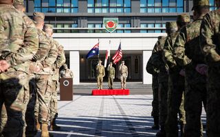 The American and Japanese contingents stand at ease while attending the Exercise Yama Sakura 85 Opening Ceremony at Camp Asaka, Tokyo