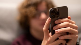 Teenager using a mobile phone