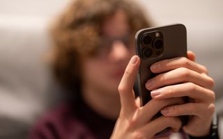 Teenager using a mobile phone