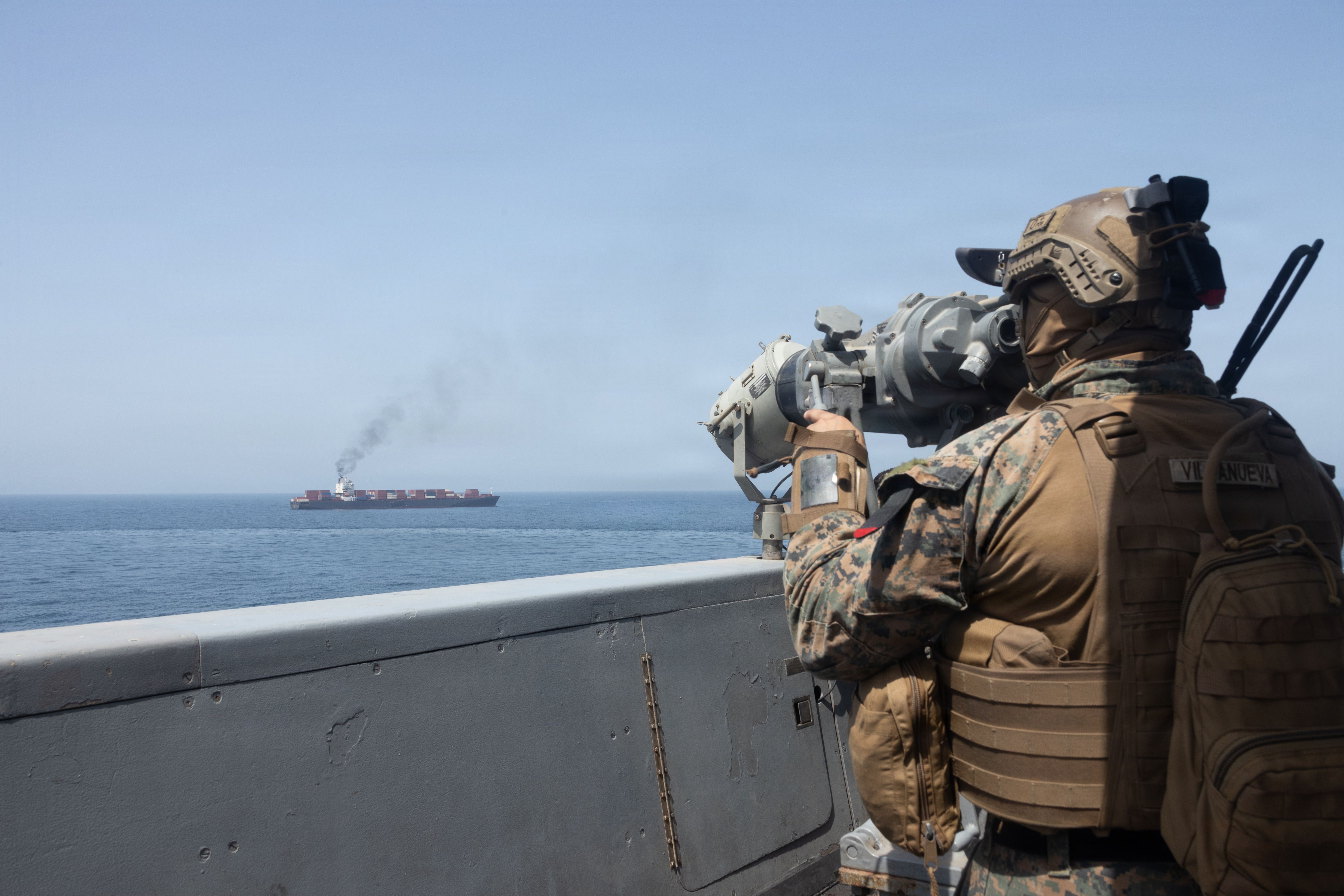 U.S. forces patrol the Arabian Sea near M/V Touska on April 20, 2026, after firing upon the Iranian-flagged vessel that the U.S. accused of attempting to violate the U.S. naval blockade of Iranian ports near the Strait of Hormuz. 
