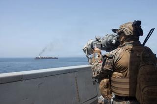 U.S. forces patrol the Arabian Sea near M/V Touska on April 20, 2026, after firing upon the Iranian-flagged vessel that the U.S. accused of attempting to violate the U.S. naval blockade of Iranian ports near the Strait of Hormuz.