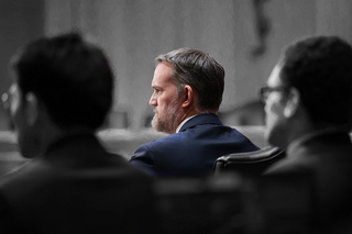 Jamieson Greer looks on at a hearing.