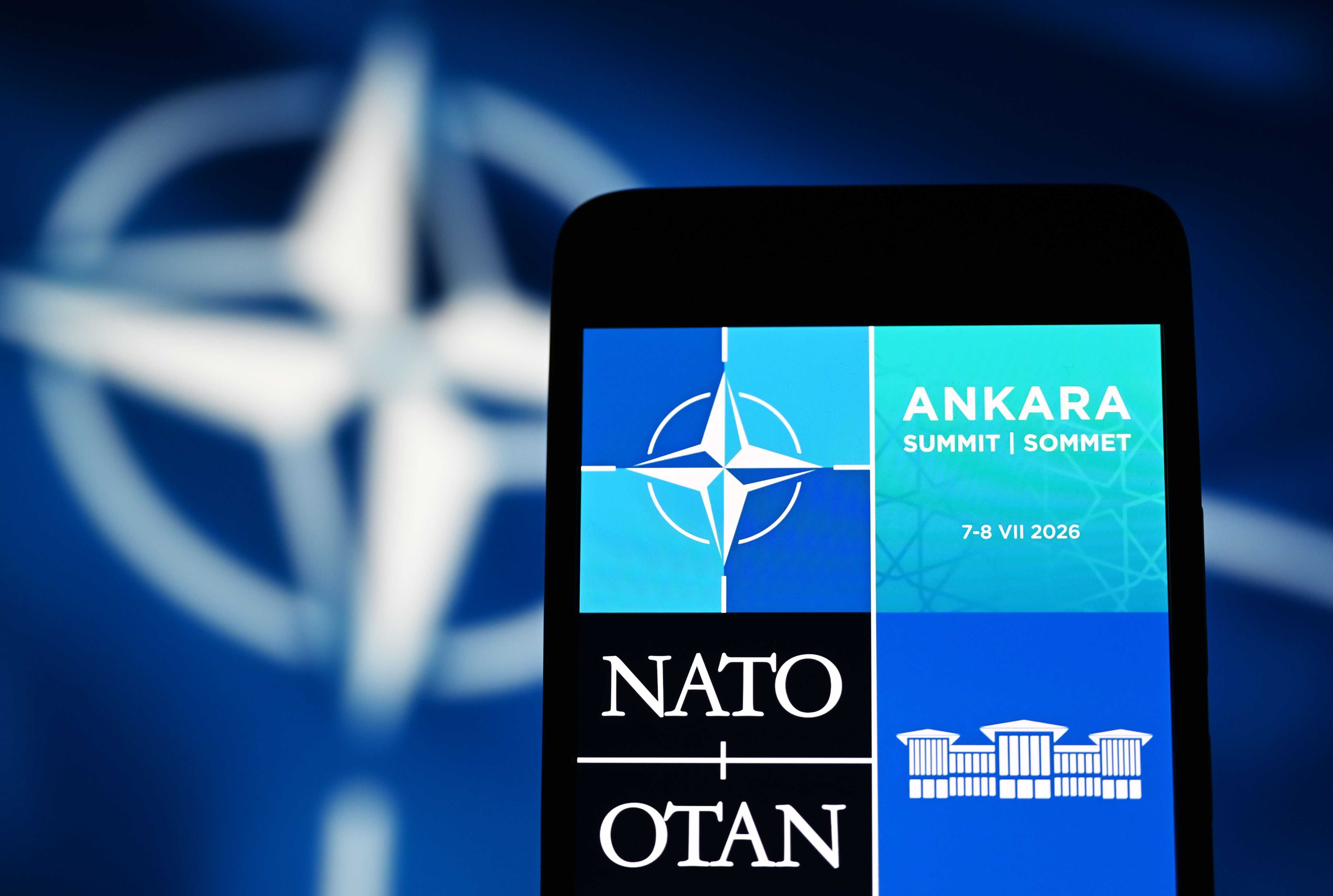 In this photo illustration, a 2026 Ankara NATO summit logo is seen on a smartphone screen. The 2026 Ankara Summit is a future meeting of NATO member states, scheduled to be held in Ankara, Turkey, on 7–8 July 2026. (Photo Illustration by Pavlo Gonchar/SOPA Images/LightRocket via Getty Images)